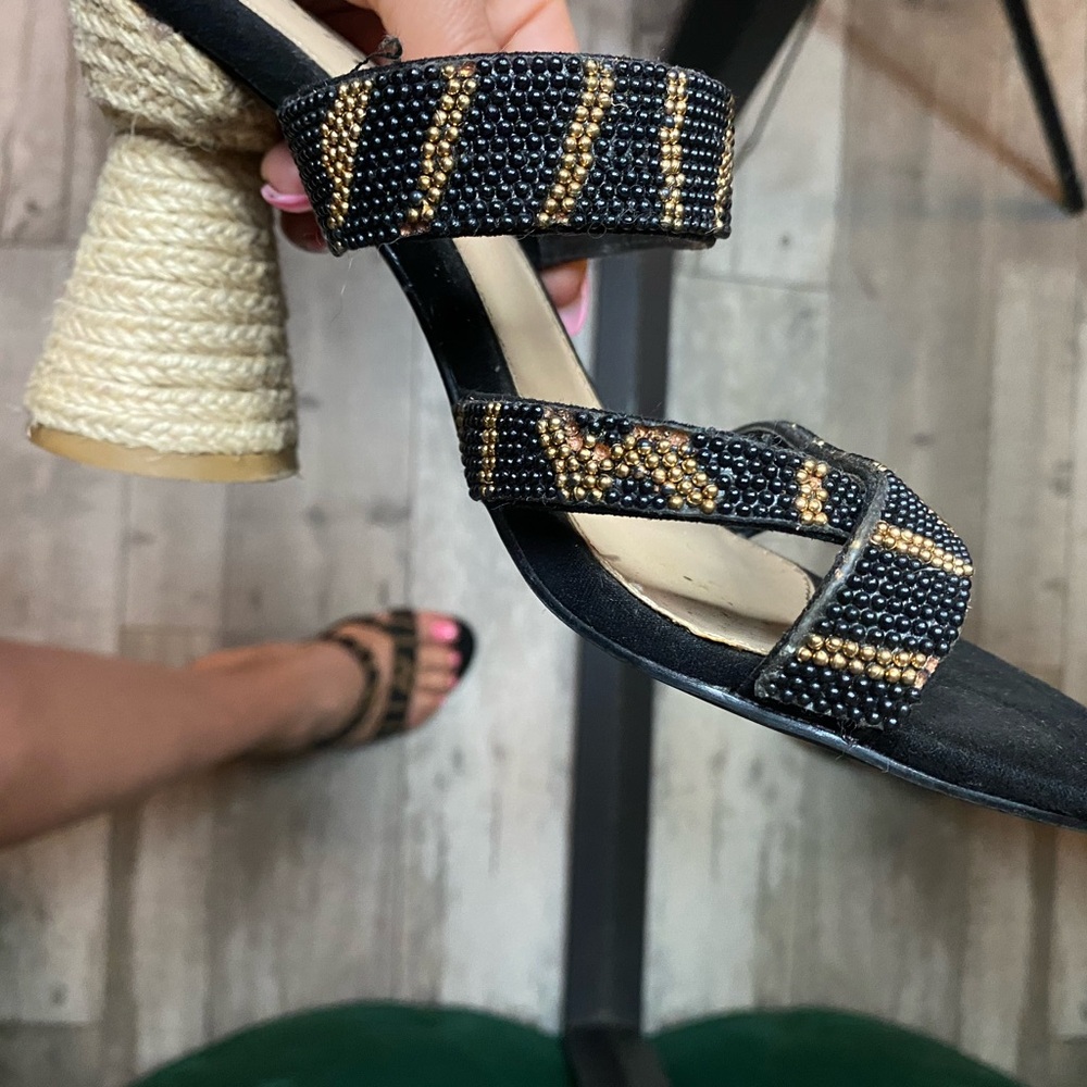 Black and gold heeled sandals